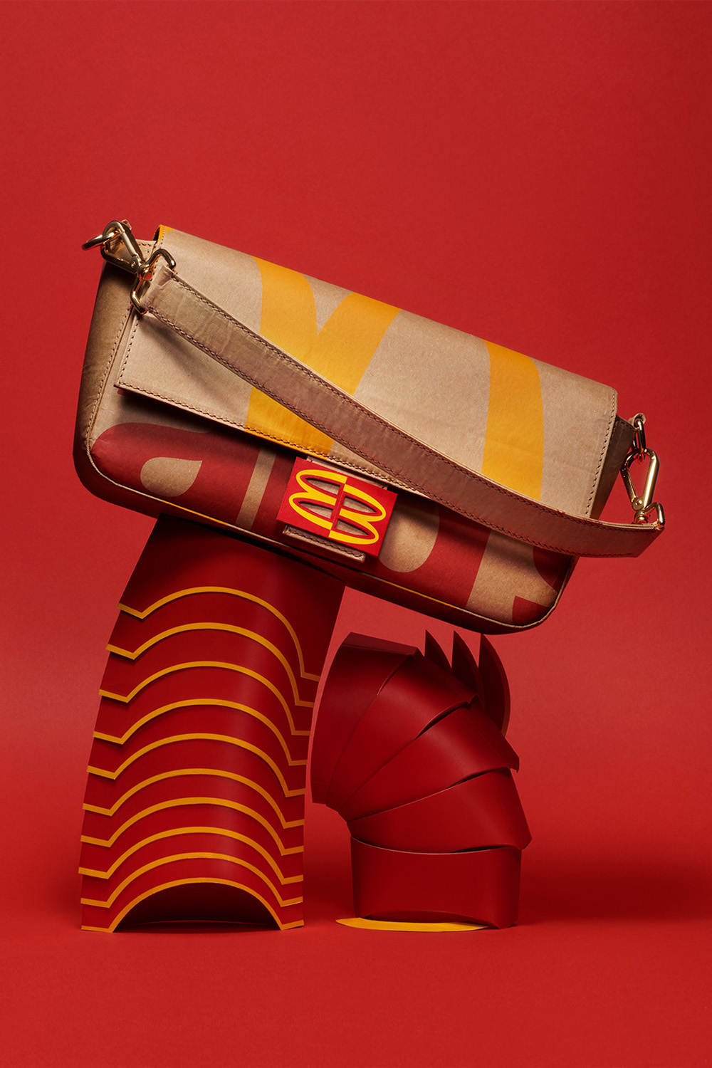 composition with a fendi baguette bag made out from a macdonald's bag