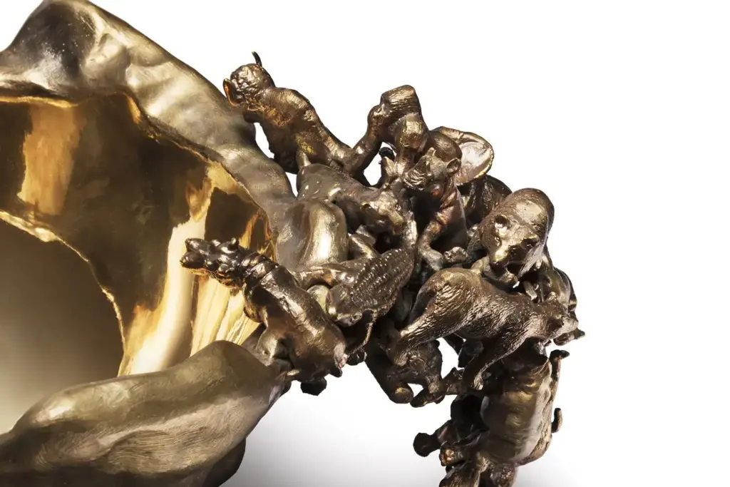 close up of golden bowl with animals designed by campana brothers