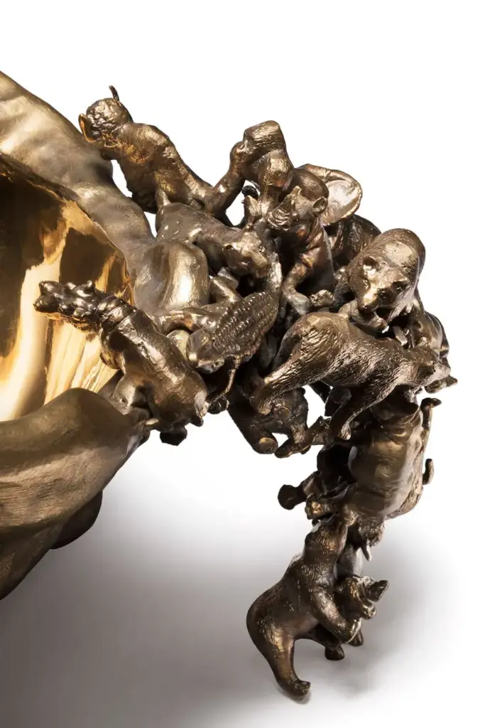 close up of golden bowl with animals designed by campana brothers