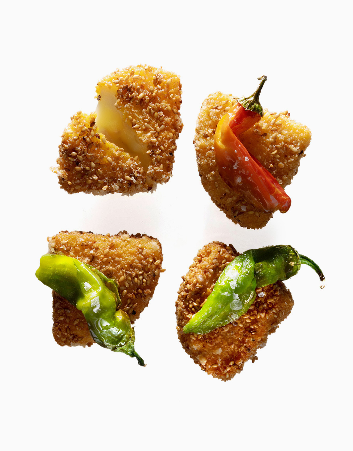cheese nuggests with jalapenos on white background