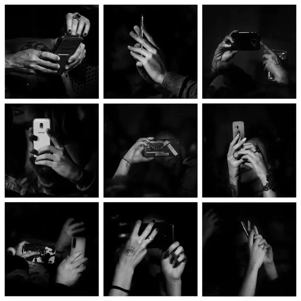 hands holding cell phones