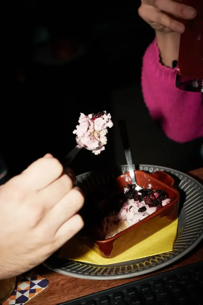 People eating tiramisu
